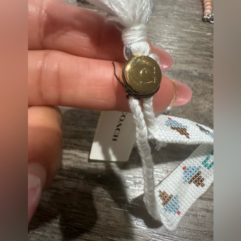 Coach ice cream beaded bracelet new .  Color White - Picture 6 of 6